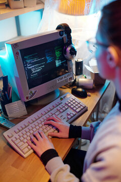 Web Developer Writing Code on Retro Computer