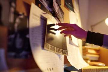 Investigator Adding Picture to Pin Board