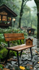 Naklejka premium Wooden bench in a misty forest path