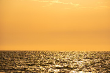 Enjoy a panoramic view of the skyline. The sun rises in the morning sky with colorful clouds. and beautiful cloud patterns In the soft light of the morning	