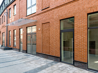 red brick warehouse after renovation works. urban industrial district.