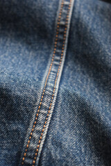 Fototapeta premium seam of blue denim texture background, jean fashion style