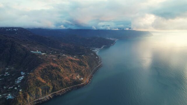 Blue sea with mountains background. Nature background with mountains and sea.