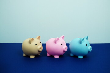 Piggy Bank Saving with space copy on blue background