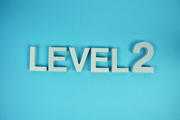 Level 2 Level Two alphabet letters on blue background