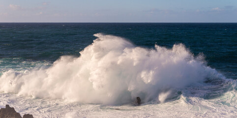 Powerful storm waves in Porto Moniz, on the Madeira Atlantic coastline, Portugal