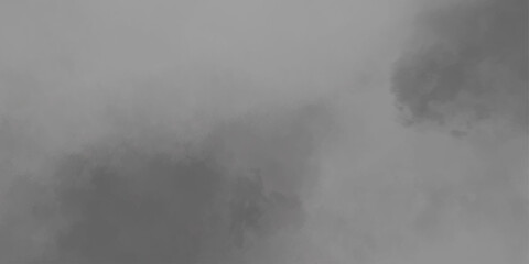 Smoke drifting against a dark background