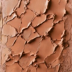 Background: Close-up of a textured, abstract surface of a natural earth-tone color palette, evoking a sense of raw artistry and tactile experience.