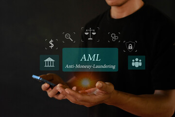 Anti Money Laundering Concept Businessman Showing AML Icon On Virtual Screen To Enforce Anti Money Laundering Regulations