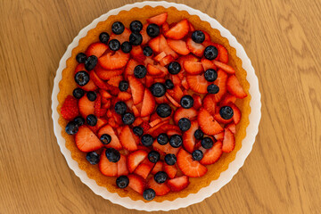 Strawberry pie top view. Beautiful fruit cake on the table. Homemade cakes
