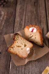 Canele, small dessert on wooden background