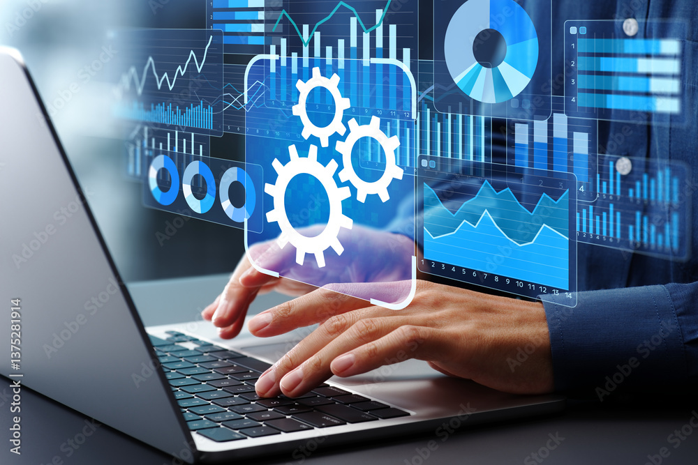 Fototapete Automated reporting and business intelligence. Data automation and dashboards. Businessman using laptop computer to generate and monitor real-time reports.