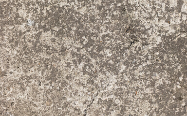 Background of destroyed concrete path, gray concrete, concrete texture, close-up. Natural photo. Old concrete slab