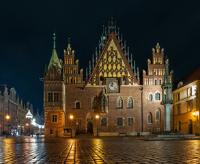 Fototapeta premium Wroclaw Town Hall Illuminated at Night with Christmas Decorations