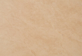 Obraz premium A seamless ceramic tile in a soft sand tone with a smooth, non-textured finish.