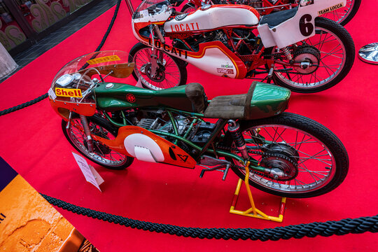 Modena, Italy : 2025 03 30 Motor Fest Expo Motorbike Two vintage Kreidler 50cc racing motorcycles, one green and one white