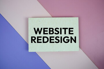 Website Redesign text on paper card on purple and pink geometric background