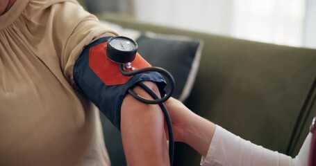Healthcare, patient and hands of nurse for blood pressure, diabetes assessment and medical check up in home. Caregiver, test and pump on person arm for diagnosis, hypertension level and consultation