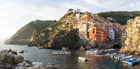 A sunset panoramic view of Riomaggiore, Cinque Terre, Italy