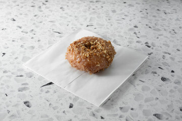 A view of a cinnamon crumb donut.