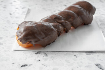 A view of a chocolate twist donut.