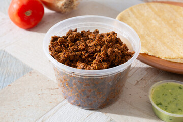 A view of a cup of turkey chorizo.