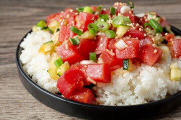 A closeup view of a poke rice bowl.