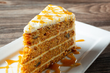 A closeup view of a slice of carrot cake.