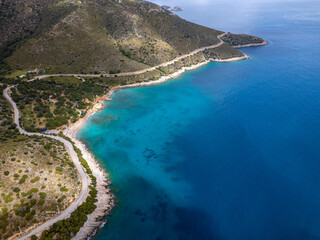 Winding coastal road following the turquoise mediterranean sea in Palamut Buku.