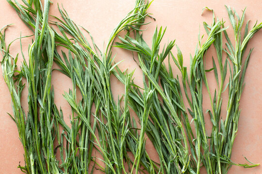 A top down view of a pile of pipicha, as a background.