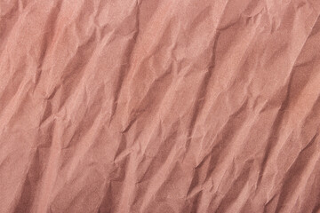 Fototapeta premium Abstract wrinkled muted mauve crumpled paper texture background