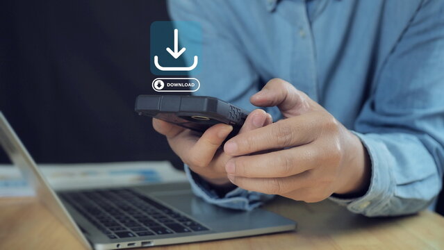 Person using smartphone with download icon. Download organizational information or documents. Data Storage, cloud storage technology.