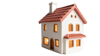 Small White House Model with Red Roof and Orange Windows on a Light Background for Home Decor Ideas