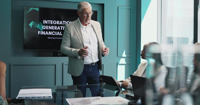 Presentation, meeting and mature businessman in office with integration of generative AI on financial service. Discussion, screen and speaker with bankers for tech development to detect finance fraud