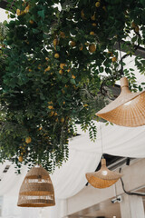 restaurant decor with beautiful chandeliers and lemons