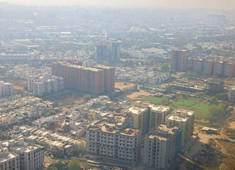 Obraz premium Aerial view while flying in to Ahmedabad Airport (AMD), officially Sardar Vallabhbhai Patel International Airport, by air, Gujarat, India.