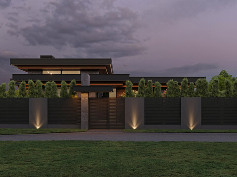 Modern house with flat roof and panoramic windows. Exterior. Evening illumination of the facade. House with swimming pool and large terrace. Modern architecture