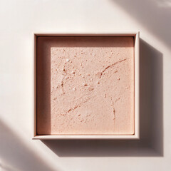 powder in a box on a light background