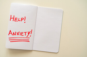 Blank journal page, with the word Anxiety in red. Anxiety and a request for help.
