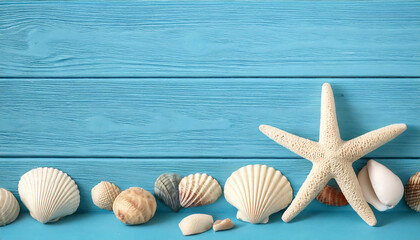 beach scene concept with sea shells and starfish on a blue wooden background
