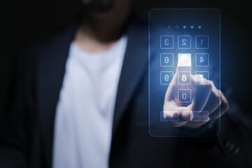 Businessman Hand pressing passcode button on virtual screen to unlock, security system, cyber security