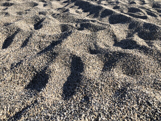 Sand with steps top view, background, texture