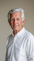 Portrait of a Confident Senior Man in a White Shirt