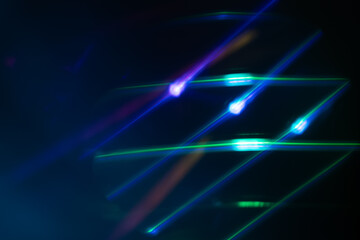 Colorful glow Light flare sparks texture. red orange rays on dark blue abstract overlay