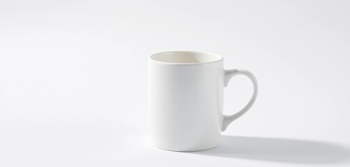 Obraz premium Clean, bright white ceramic mug on plain background, retro, mockup