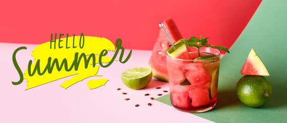 Glass of fresh watermelon lemonade with lime and mint on colorful background
