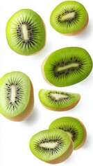 Fototapeta premium Sliced kiwi reveals vibrant green flesh and tiny black seeds against a clean white backdrop. A burst of natural beauty