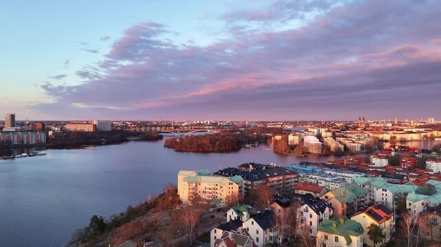 Stunning sunset over Stockholm, Sweden, aerial view from the area of Gr&ouml;ndal, view over the old town