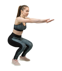A young slim athletic girl in sportswear with snakeskin prints performs a set of exercises.