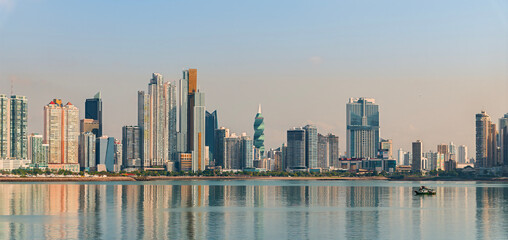 A view of reflections of modern Panama City in the early morning in springtime